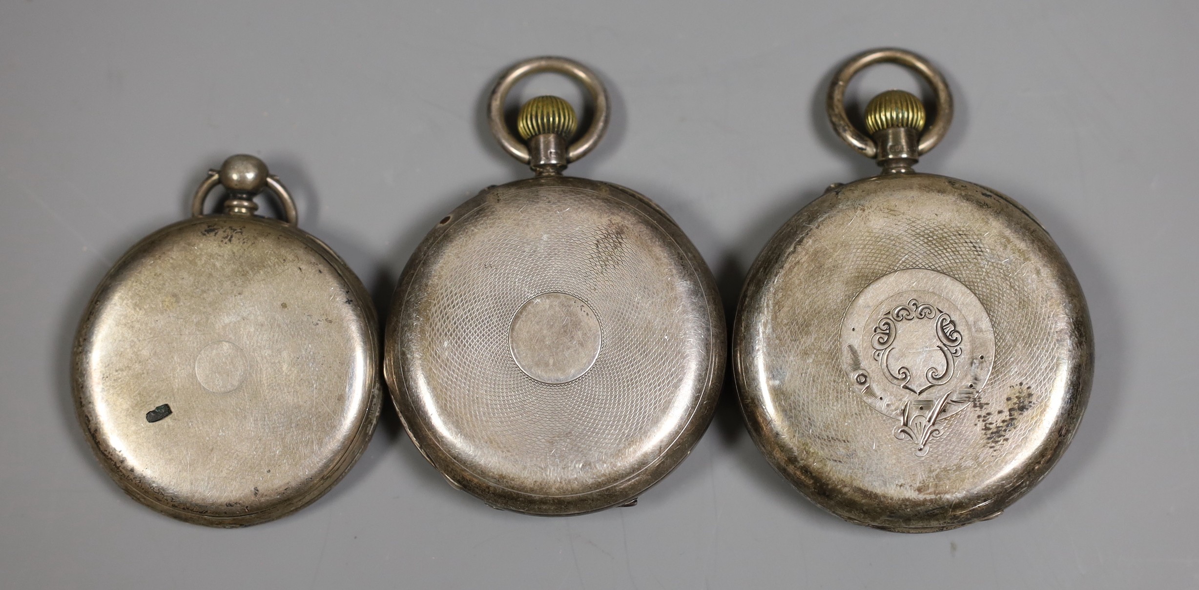 Two silver pocket watches including half hunter and one other white metal open faced pocket watch(lacking glass).